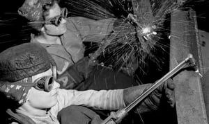 Two women welding