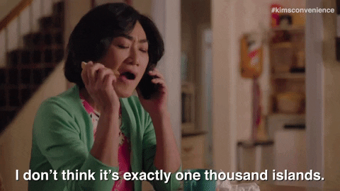 Animated gif of an older woman of Asian heritage speaks into the telephone: I don't think it's exactly one thousand islands