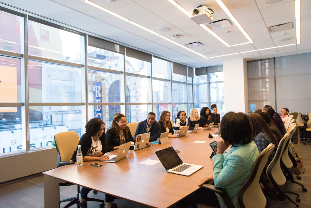 Group of women at a conference table