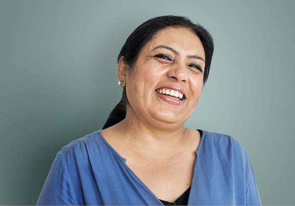 A woman smiling