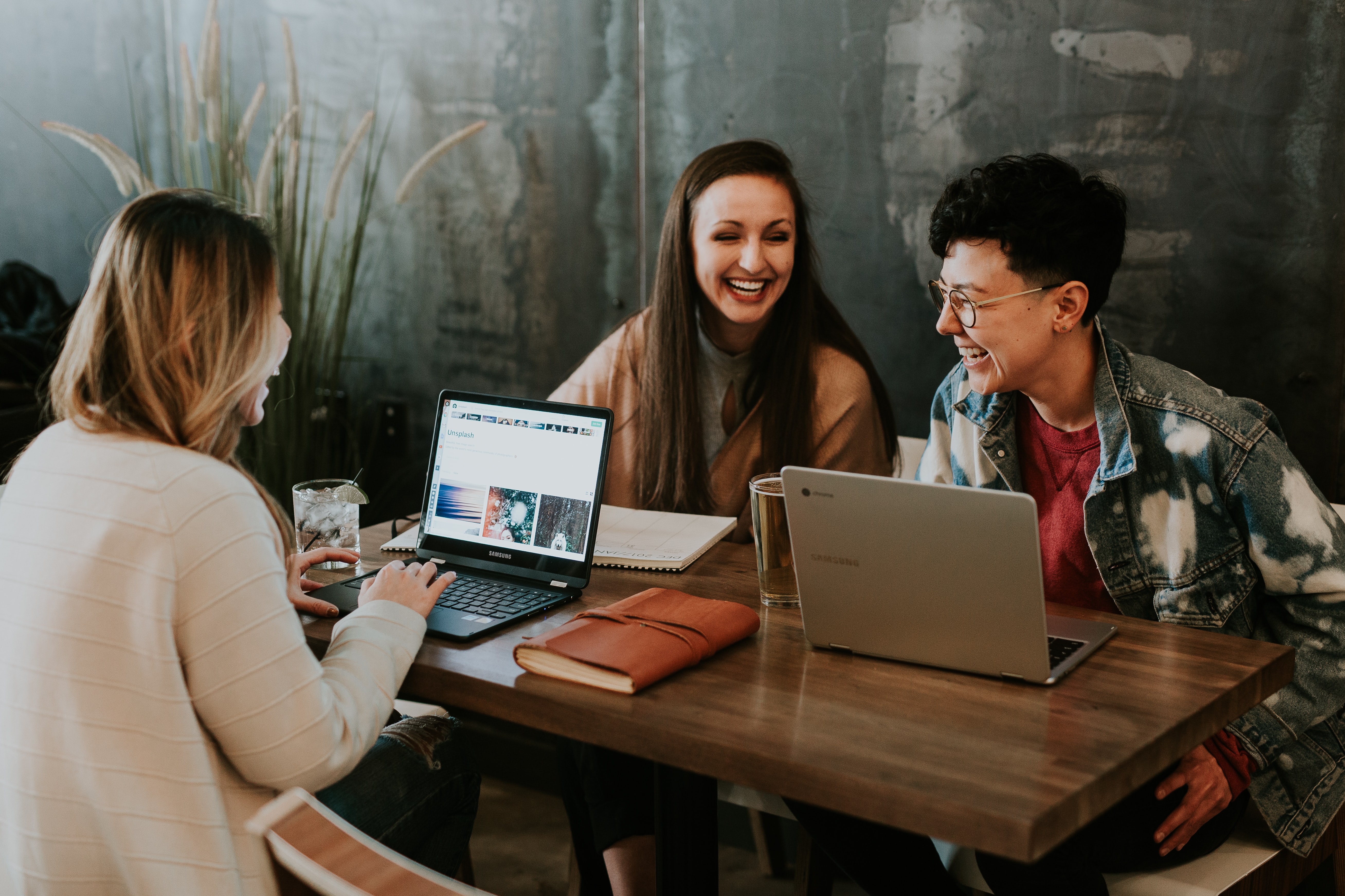 3 women working on computers