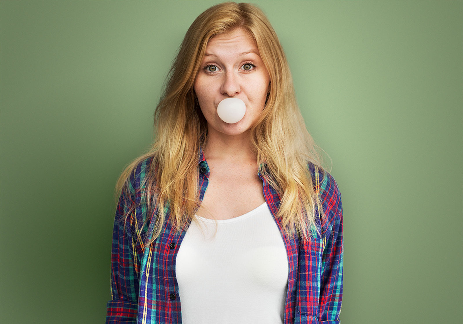 A young woman with a bubble gum